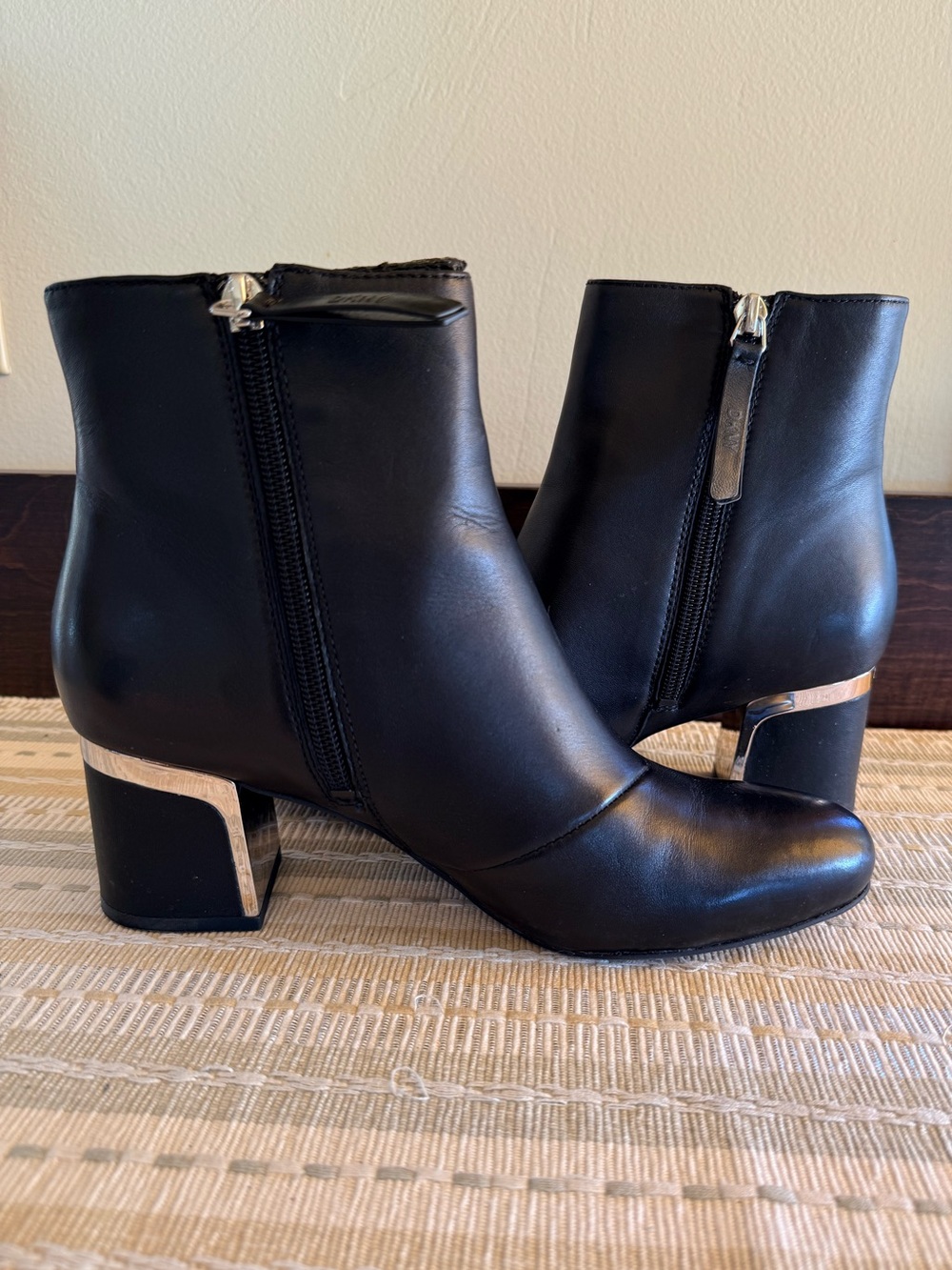 DKNY “Corrie” Black Leather Ankle Boots w/Sleek Metallic Accent Block Heel - 7.5